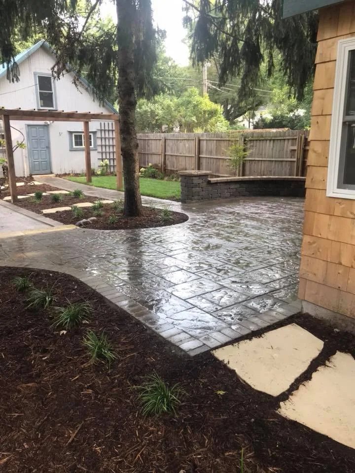 Retaining wall and landscape installation — Iowa City, IA