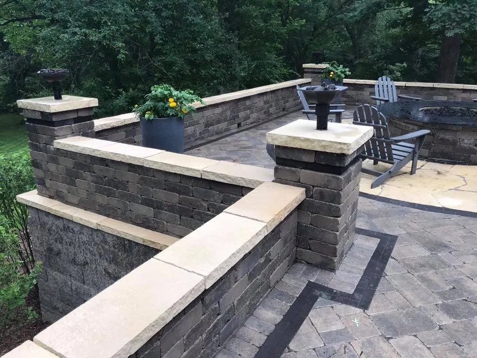 Paver seating wall and outdoor living — Iowa City landscape