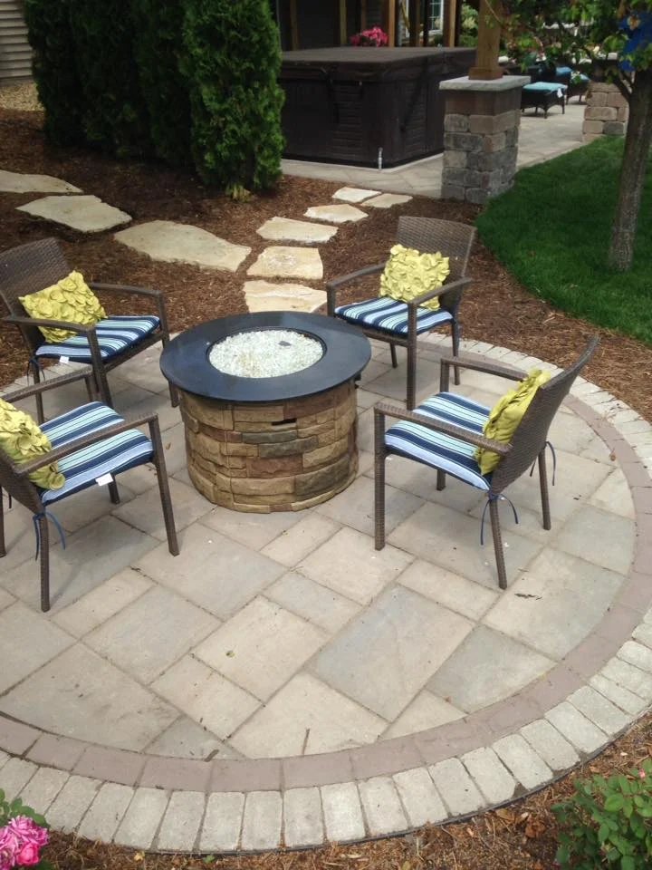 Circular fire pit patio installation — Fiddlehead Gardens